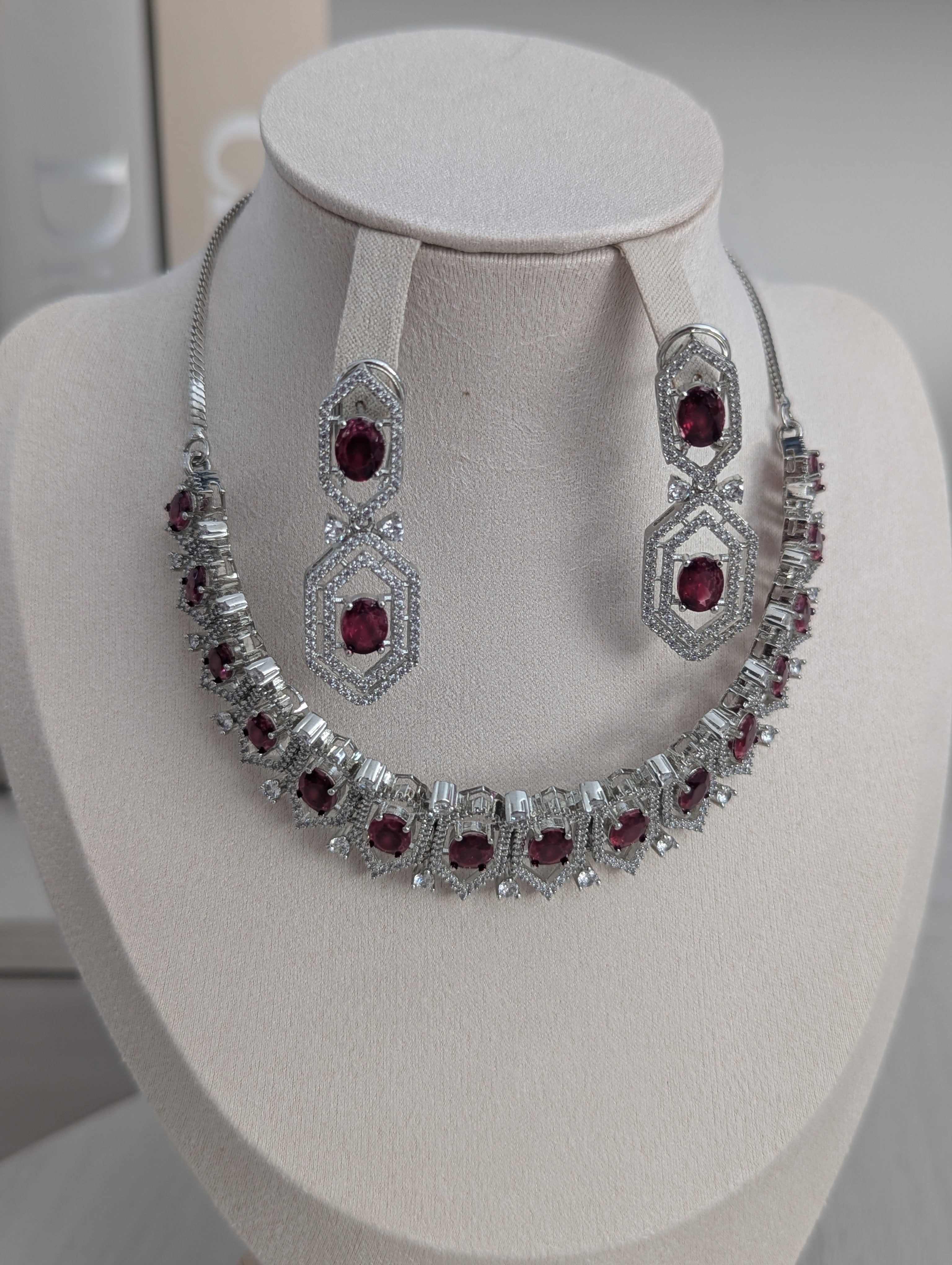Annalise Exceptional Quality CZ Ruby and Clear Stone Necklace Earring Set – White Gold Plating Opulent Design