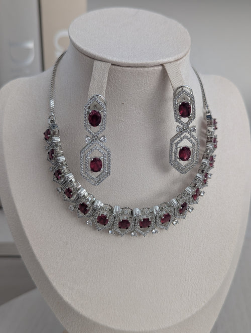 Annalise Exceptional Quality CZ Ruby and Clear Stone Necklace Earring Set – White Gold Plating Opulent Design