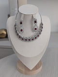 Annalise Exceptional Quality CZ Ruby and Clear Stone Necklace Earring Set – White Gold Plating Opulent Design
