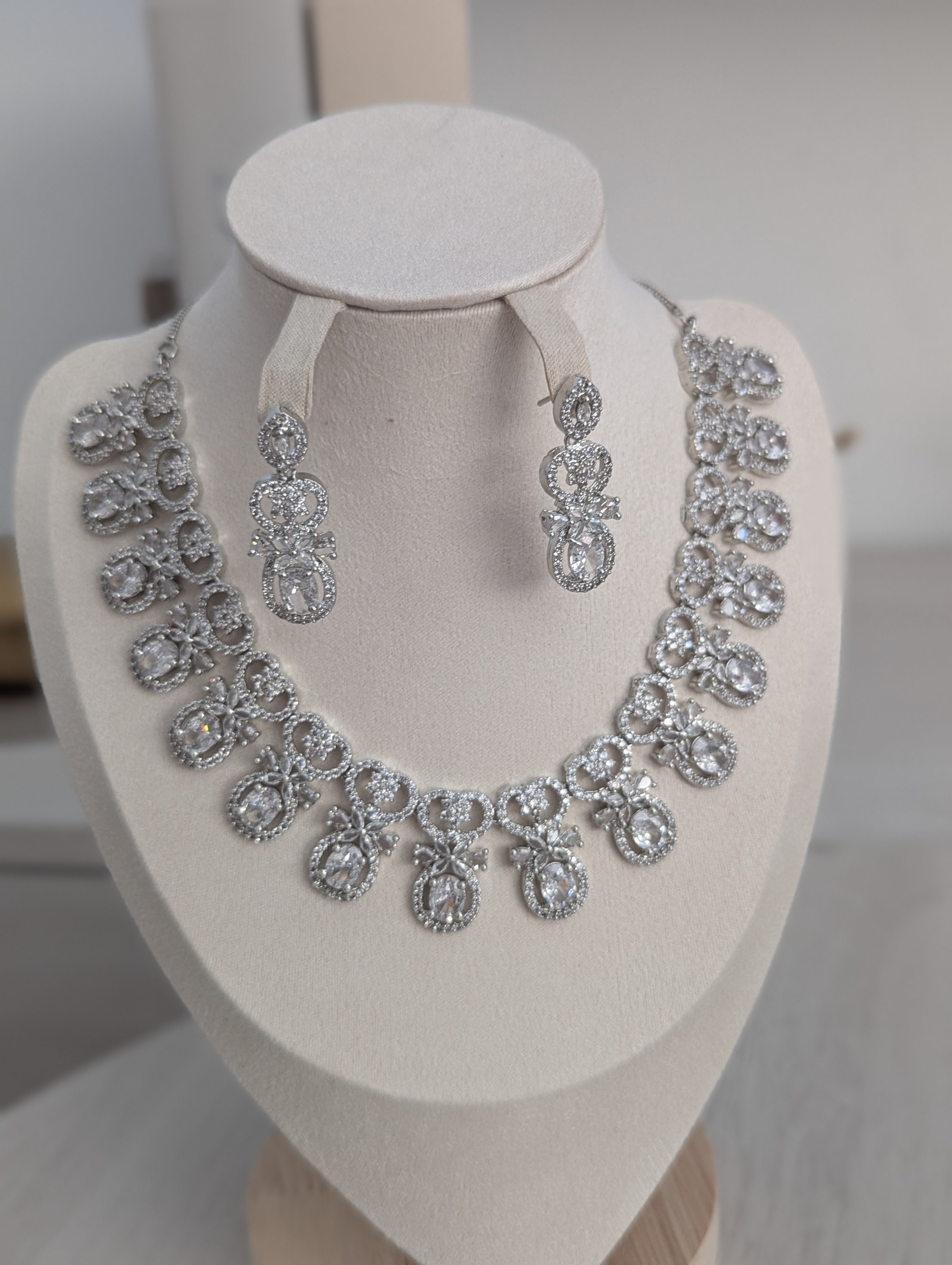 Dulcinea Necklace and Earring Set – Exceptional Quality CZ Clear Stones, White Gold Plating, Bow Design